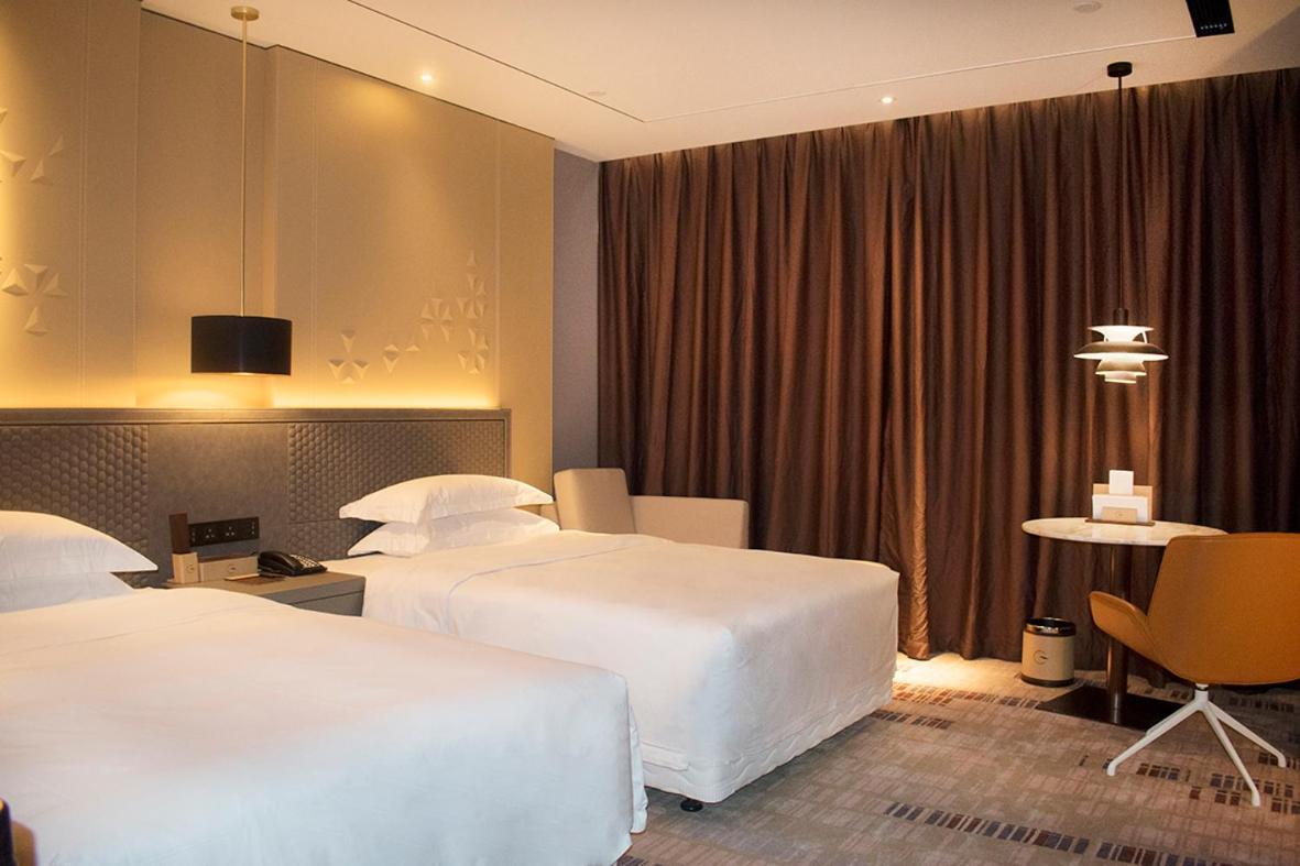 Grand Skylight International Hotel Haoyue Shenzhen Baoan Int'L Exhibition Center ภายนอก รูปภาพ