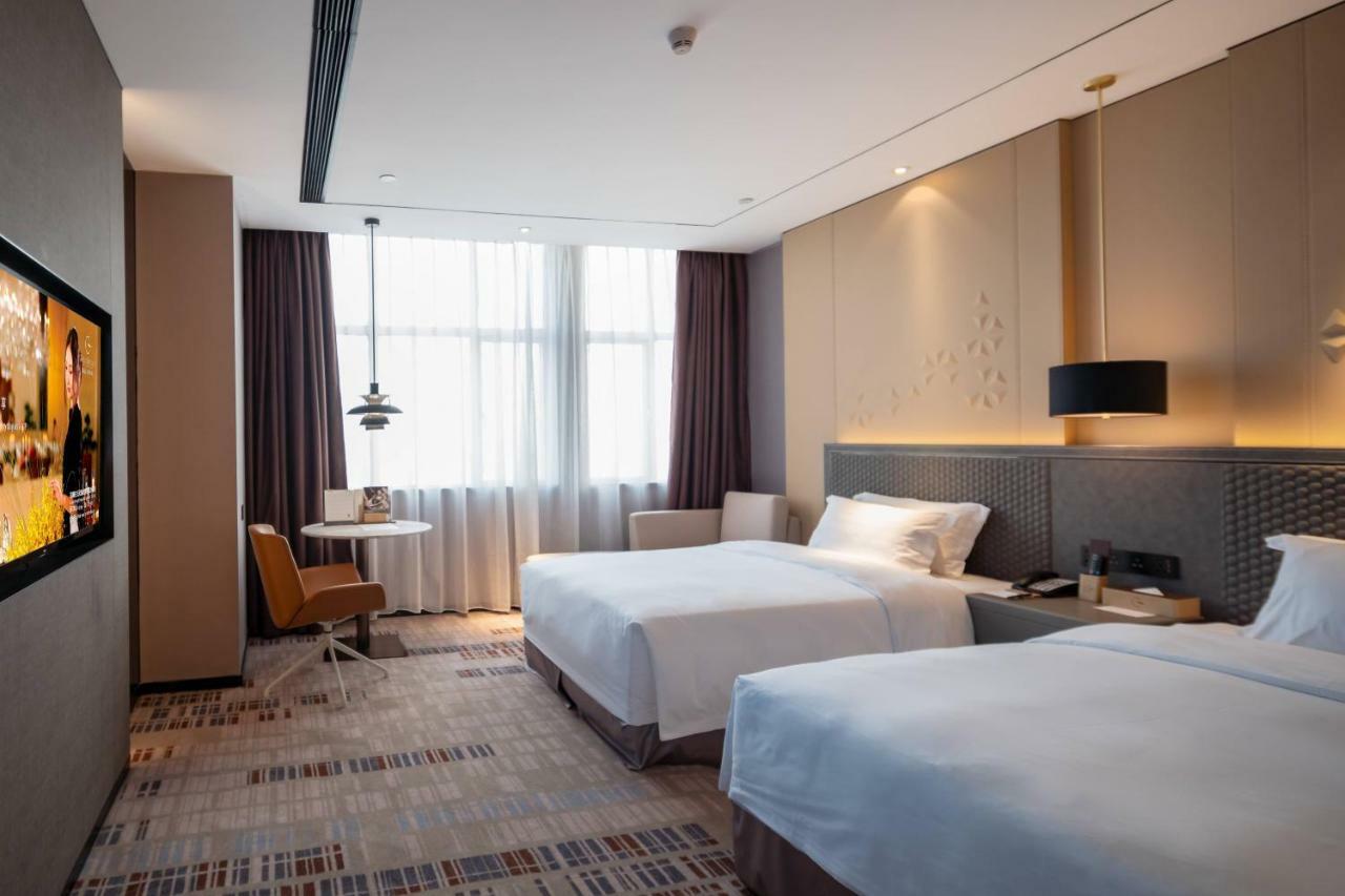 Grand Skylight International Hotel Haoyue Shenzhen Baoan Int'L Exhibition Center ภายนอก รูปภาพ
